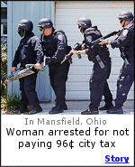 Woman arrested in Mansfield, Ohio for not paying 96 cent city tax. Ok, they really didn't send the swat team, but it would have been a nice touch. Click here for the story.